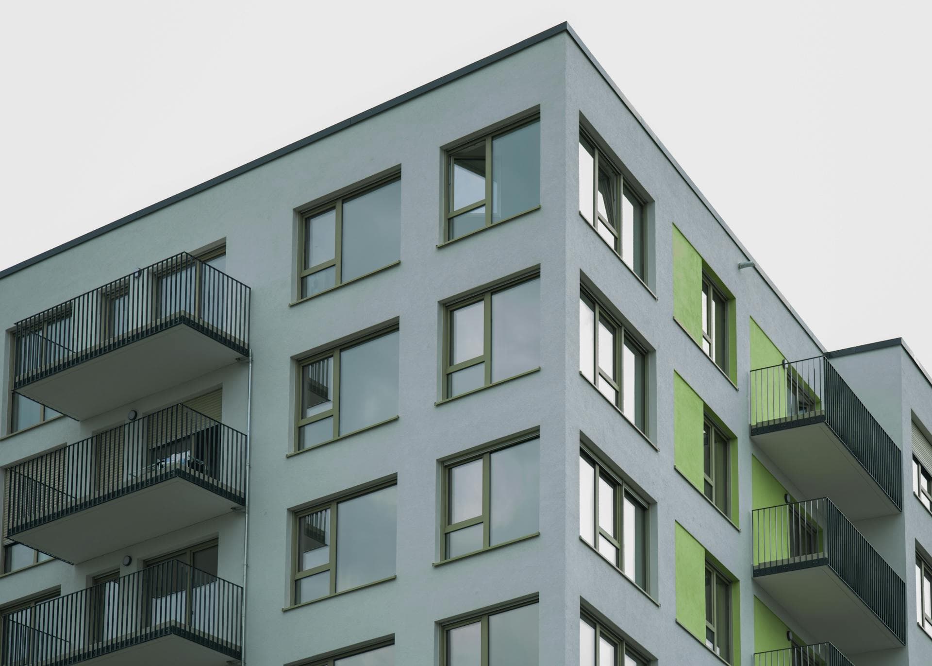 Exterior of a multifamily apartment building with balconies