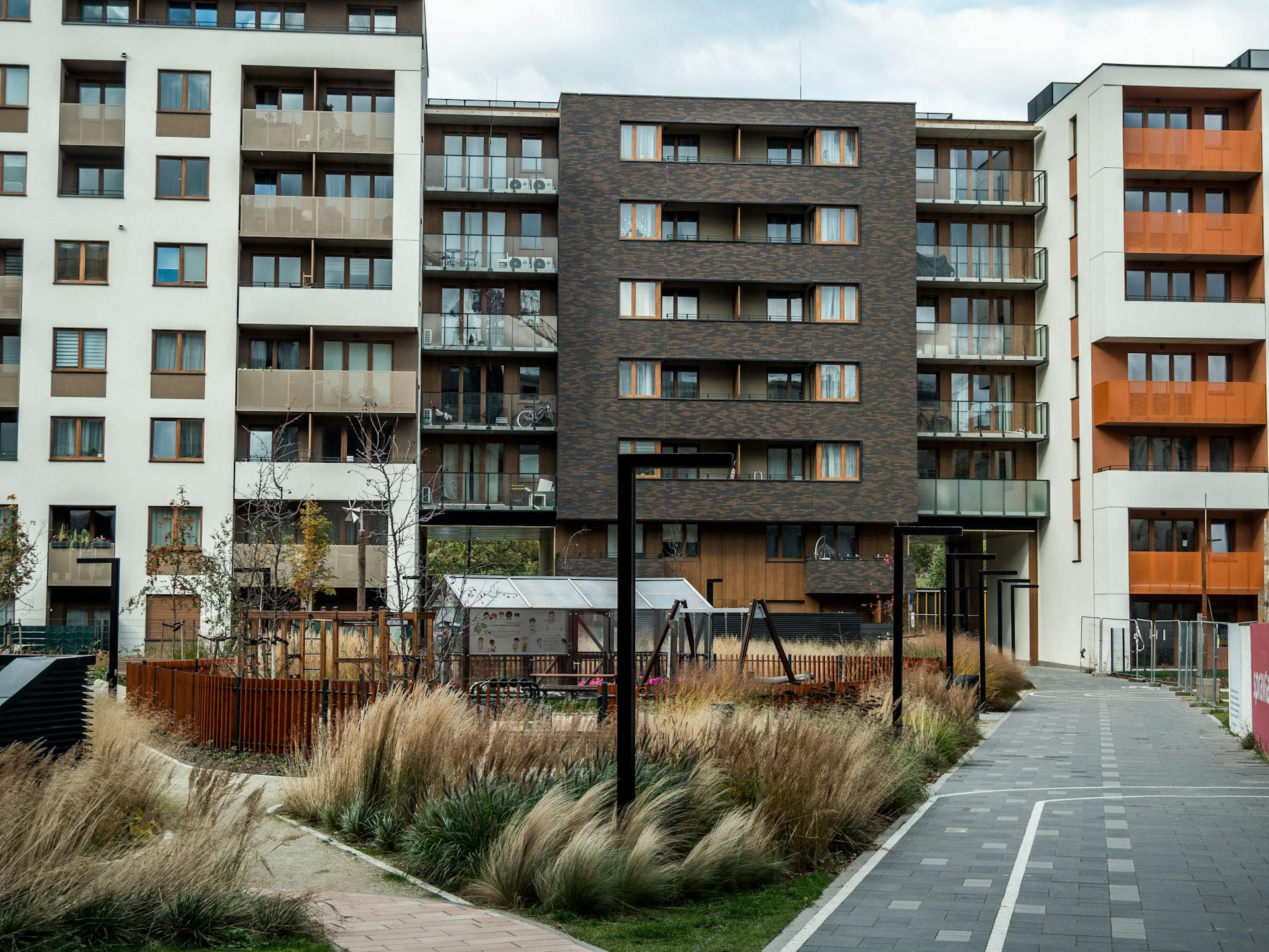 Affordable multifamily housing community with a playground